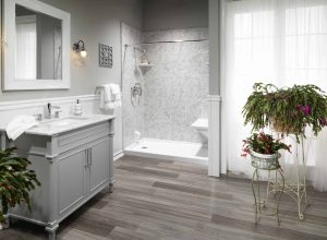 Picture of a gray bathroom with a stylish new shower enclosure.