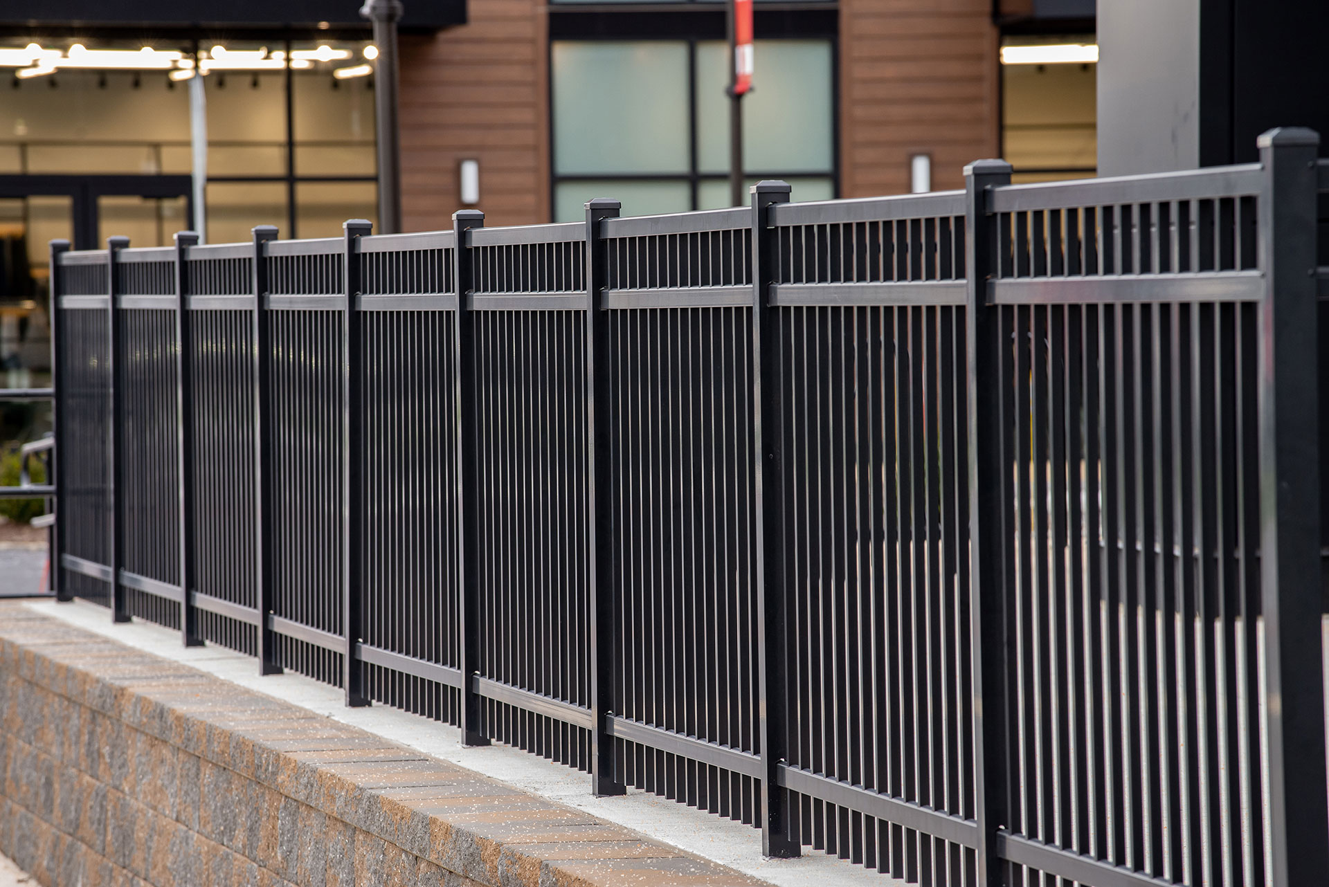 A black aluminum fence.